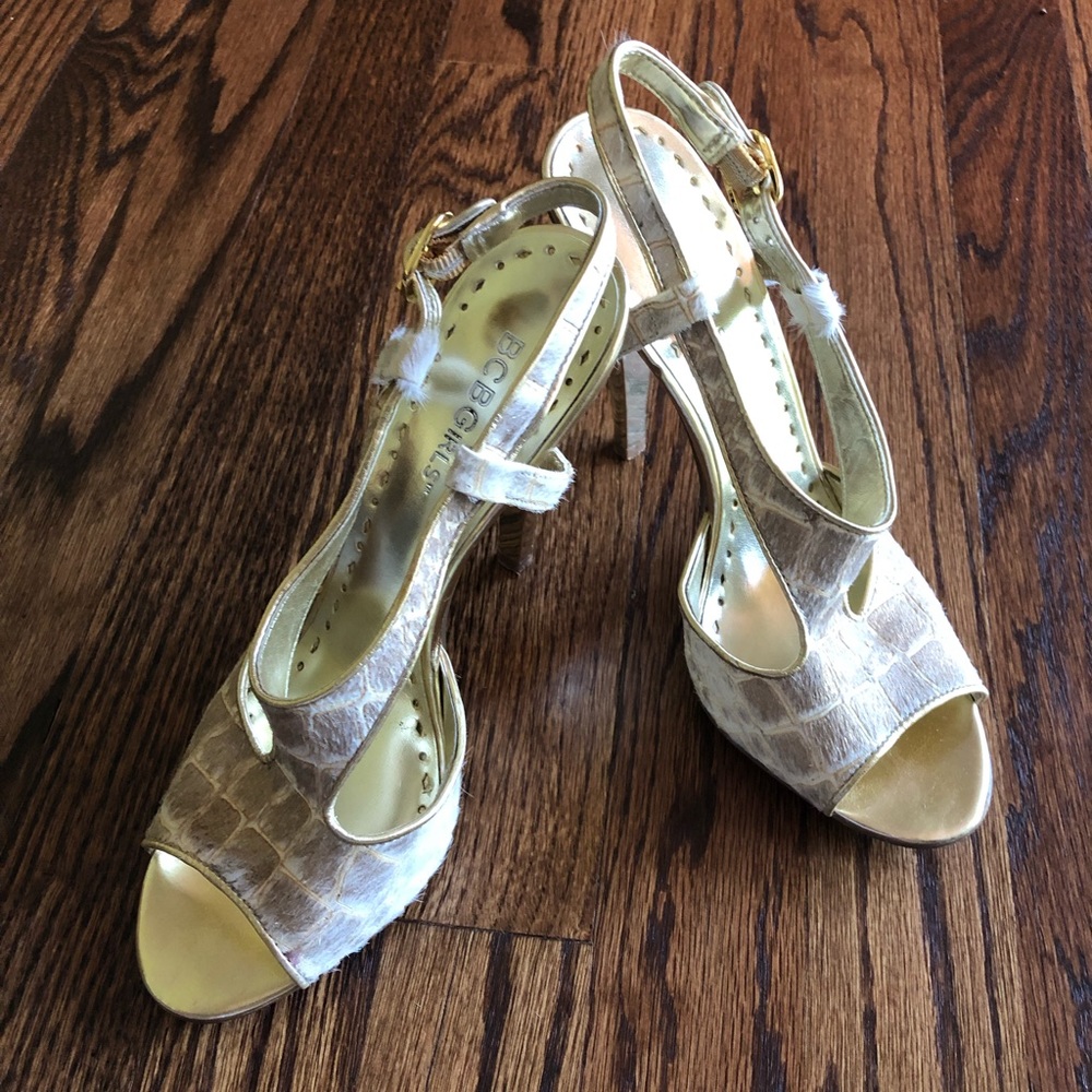 Peep toe snake skin heels